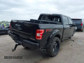 2020 Ford F-150 XL with VIN 1FTEW1E5XLKF16129, listed as a IAAI auction lot 42121449 with Not provided miles and . Bid and sale history available at DreamBid. Image 4.