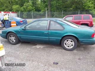 1996 Ford Thunderbird LX z VIN 1FALP62W9TH118637, wystawiony jako IAAI lot #42311641 z przebiegiem 96 361 mil mil oraz . Historia ofert i sprzedaży dostępna na DreamBid. Obrazek 14.