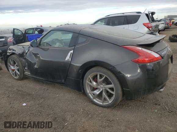 2014 Nissan 370Z Touring with VIN JN1AZ4EH2EM633814, listed as a Copart auction lot 84120274 with 22,979 mi miles and Salvage Title. Bid and sale history available at carsss.com. Image 2.