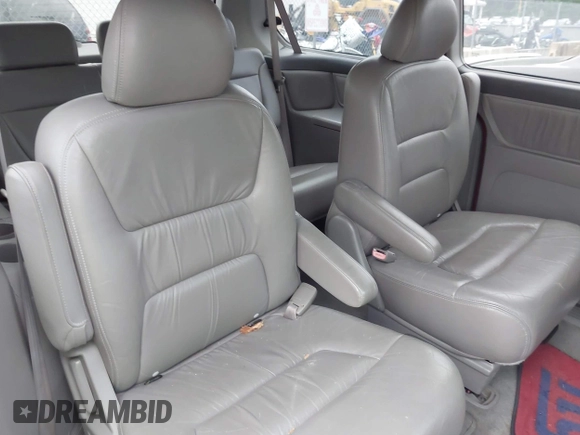 2002 Honda Odyssey EX-L z VIN 2HKRL18092H572036, wystawiony jako IAAI lot #42122713 z przebiegiem Nie podano mil oraz . Historia ofert i sprzedaży dostępna na DreamBid. Obrazek 8.