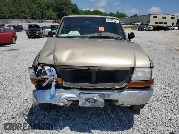 2000 Ford Ranger XL with VIN 1FTYR14VXYTA70121, listed as a Copart auction lot 56024985 with 271,426 mi miles and Salvage title. Bid and sale history available at DreamBid. Image 5.