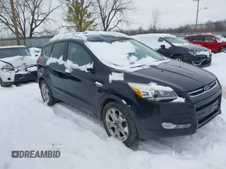 2016 Ford Escape Titanium with VIN 1FMCU9J96GUC08563, listed as a IAAI auction lot 41252475 with 120,404 mi miles. Bid and sale history available at carsss.com. Image 13.