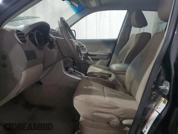2011 Suzuki Grand Vitara Premium with VIN JS3TD0D28B4102673, listed as a Copart auction lot 43216005 with 141,726 mi miles and Salvage title. Bid and sale history available at DreamBid. Image 7.