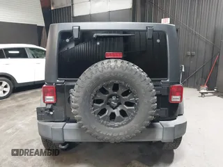 2015 Jeep Wrangler Unlimited Willys Wheeler with VIN 1C4BJWDG1FL749803, listed as a IAAI auction lot 41995132 with 156,595 mi miles and . Bid and sale history available at DreamBid. Image 17.