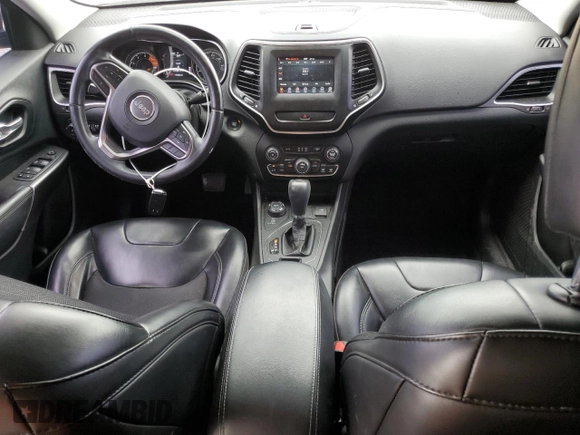 2019 Jeep Cherokee Latitude Plus with VIN 1C4PJMLN8KD123969, listed as a Copart auction lot 54784235 with 119,468 mi miles and Salvage title. Bid and sale history available at DreamBid. Image 8.