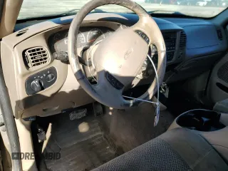 2001 Ford F-150 XL with VIN 1FTRX18L11NA45878, listed as a Copart auction lot 44269355 with 0 mi miles and Salvage Title. Bid and sale history available at carsss.com. Image 8.