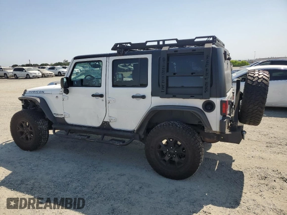 2014 Jeep Wrangler Unlimited Rubicon with VIN 1C4BJWFG0EL201559, listed as a Copart auction lot 59580575 with 182,101 mi miles and Salvage title. Bid and sale history available at DreamBid. Image 2.