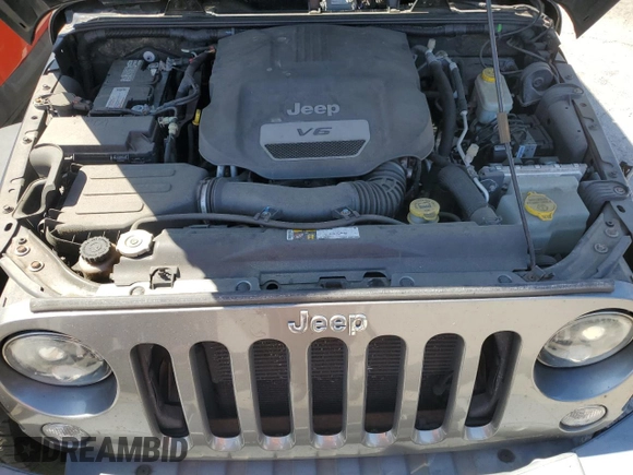 2015 Jeep Wrangler Unlimited Freedom with VIN 1C4HJWDG0FL598947, listed as a Copart auction lot 61794214 with 125,778 mi miles and Salvage title. Bid and sale history available at DreamBid. Image 14.