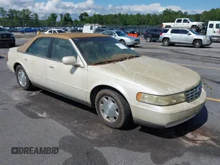 2001 Cadillac Seville Luxury SLS z VIN 1G6KS54Y81U110047, wystawiony jako IAAI lot #42436746 z przebiegiem 107 360 mil mil oraz . Historia ofert i sprzedaży dostępna na DreamBid. Obrazek 1.