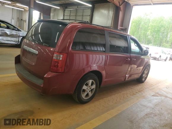 2010 Dodge Grand Caravan Hero with VIN 2D4RN3D11AR440333, listed as a Copart auction lot 53048205 with 198,991 mi miles and Salvage Title. Bid and sale history available at DreamBid. Image 3.