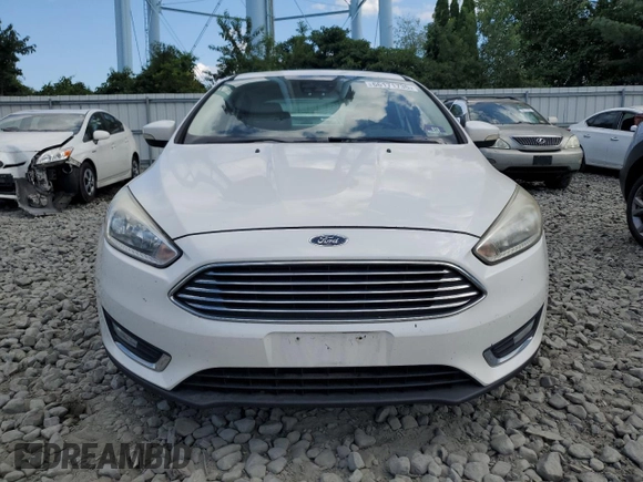 2016 Ford Focus Titanium with VIN 1FADP3J29GL223778, listed as a Copart auction lot 66171735 with Not provided miles and Salvage title. Bid and sale history available at DreamBid. Image 5.