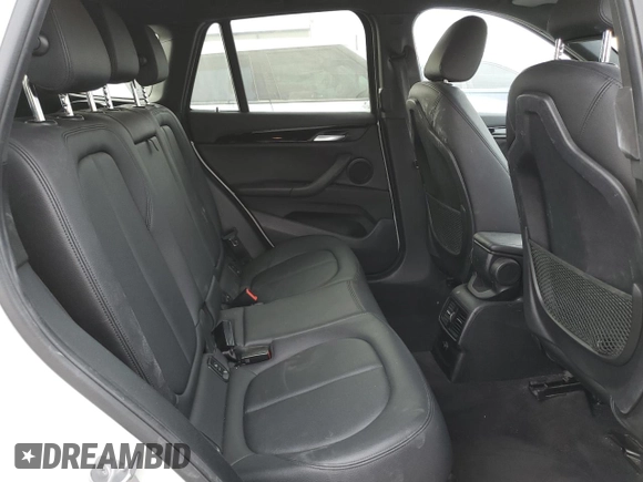 2018 BMW X1 sDrive28i with VIN WBXHU7C37J5H44386, listed as a Copart auction lot 42167135 with 96,668 mi miles and Salvage Title. Bid and sale history available at DreamBid. Image 11.