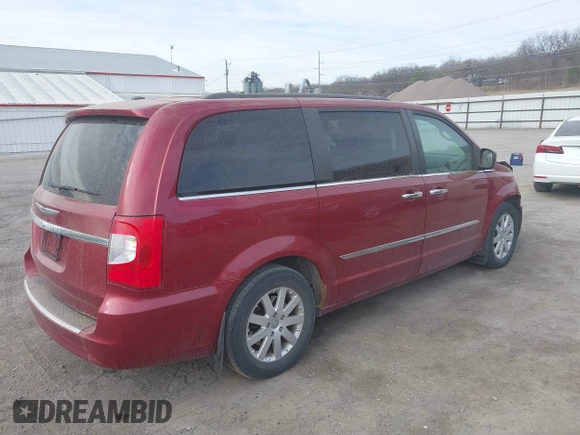 2014 Chrysler Town & Country Touring with VIN 2C4RC1BG9ER418147, listed as a IAAI auction lot 41812594 with 161,356 mi miles and . Bid and sale history available at DreamBid. Image 4.