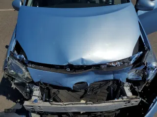 2014 Toyota Prius Plug-In with VIN JTDKN3DP5E3056010, listed as a Copart auction lot 69784694 with 83,018 mi miles and Salvage Title. Bid and sale history available at carsss.com. Image 13.