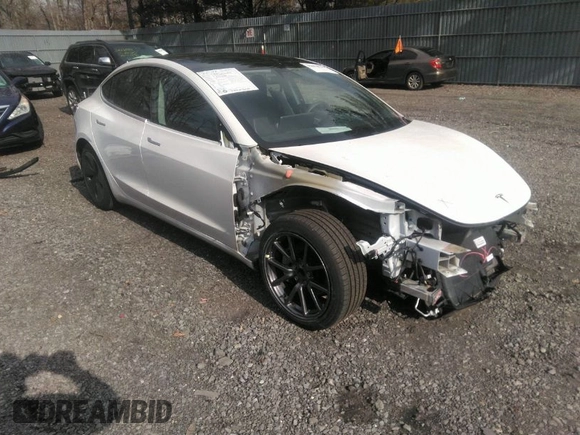 2020 Tesla Model 3 Standard Range Plus with VIN 5YJ3E1EA4LF792830, listed as a IAAI auction lot 41852919 with 76,461 mi miles. Bid and sale history available at carsss.com. Image 1.