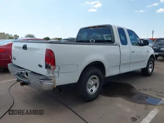 2003 Ford F-150 XL with VIN 1FTRX17L43NB82477, listed as a IAAI auction lot 42427957 with Not provided miles and . Bid and sale history available at DreamBid. Image 4.
