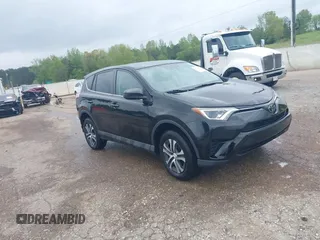 2018 Toyota RAV4 LE with VIN 2T3BFREV8JW777510, listed as a IAAI auction lot 41974675 with 62,795 mi miles. Bid and sale history available at carsss.com. Image 1.