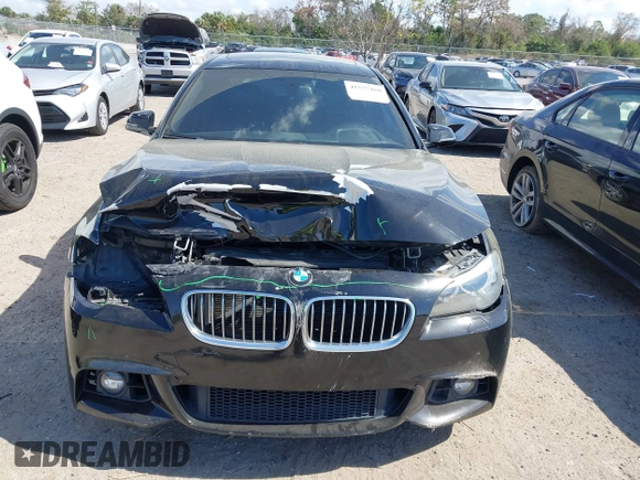 2014 BMW 5 Series 535d with VIN WBAXA5C58ED690447, listed as a IAAI auction lot 41577468 with 149,080 mi miles and . Bid and sale history available at carsss.com. Image 13.