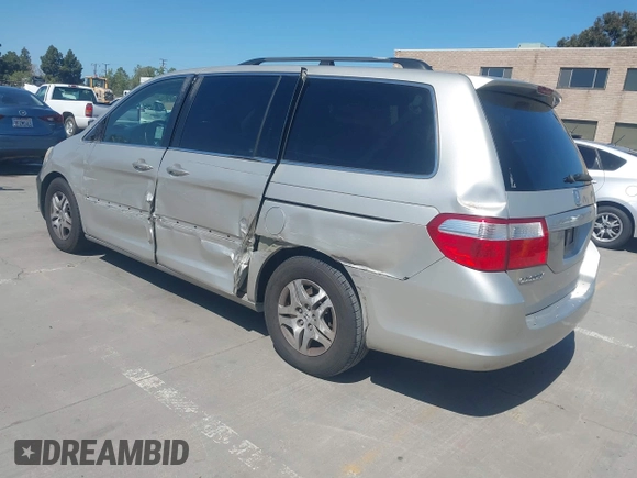2006 Honda Odyssey EX-L with VIN 5FNRL38766B038599, listed as a IAAI auction lot 41989217 with 164,118 mi miles. Bid and sale history available at carsss.com. Image 3.