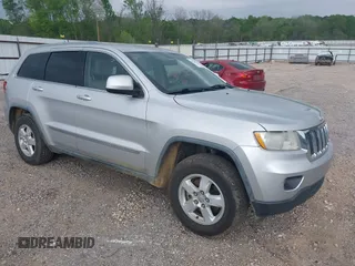 2011 Jeep Grand Cherokee Laredo with VIN 1J4RS4GGXBC564035, listed as a IAAI auction lot 41931861 with 242,291 mi miles and . Bid and sale history available at DreamBid. Image 1.