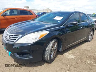 2014 Hyundai Azera with VIN KMHFG4JG3EA354276, listed as a IAAI auction lot 41892879 with 114,147 mi miles and . Bid and sale history available at carsss.com. Image 2.