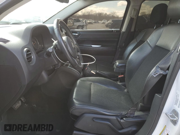 2014 Jeep Compass Latitude with VIN 1C4NJCEAXED531759, listed as a Copart auction lot 50620335 with 144,803 mi miles and Salvage Title. Bid and sale history available at carsss.com. Image 7.