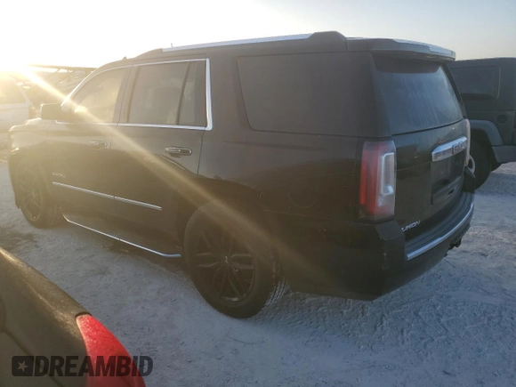 2015 GMC Yukon Denali with VIN 1GKS2CKJ5FR529091, listed as a Copart auction lot 77325934 with 0 mi miles and Clean Title. Bid and sale history available at carsss.com. Image 2.