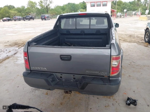 2009 Honda Ridgeline RT with VIN 2HJYK16279H501015, listed as a IAAI auction lot 41996301 with 124,716 mi miles. Bid and sale history available at carsss.com. Image 16.