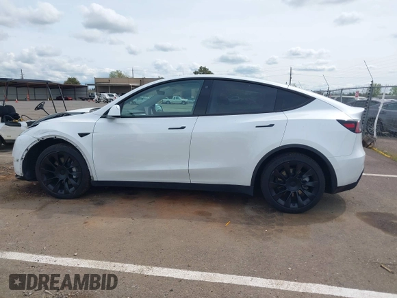 2022 Tesla Model Y Long Range with VIN 7SAYGDEE2NF403354, listed as a IAAI auction lot 41986216 with 53,177 mi miles and . Bid and sale history available at DreamBid. Image 14.