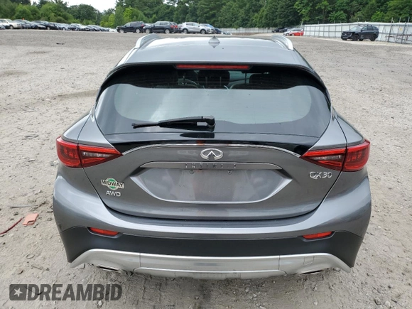 2017 Infiniti QX30 Luxury with VIN SJKCH5CR1HA026123, listed as a Copart auction lot 64003094 with 93,651 mi miles and Salvage title. Bid and sale history available at DreamBid. Image 6.