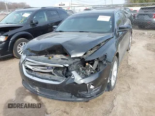 2013 Ford Taurus SEL with VIN 1FAHP2E84DG188503, listed as a IAAI auction lot 41800277 with 215,015 mi miles. Bid and sale history available at carsss.com. Image 17.