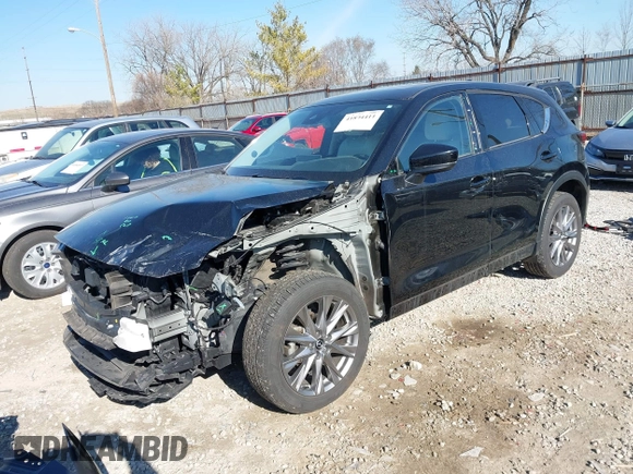 2021 Mazda CX-5 Grand Touring with VIN JM3KFBDM0M0468081, listed as a IAAI auction lot 41894411 with 54,664 mi miles. Bid and sale history available at carsss.com. Image 18.