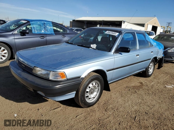 1990 Toyota Camry z VIN 4T1SV24E0LU137556, wystawiony jako Copart lot #84628404 z przebiegiem 247 203 mil mil oraz Czysty tytuł • Clean title. Historia ofert i sprzedaży dostępna na DreamBid. Obrazek 1.
