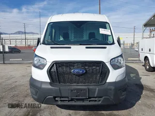 2023 Ford Transit Cargo with VIN 1FTBR1C85PKC08945, listed as a IAAI auction lot 41385685 with 5,577 mi miles and . Bid and sale history available at DreamBid. Image 13.