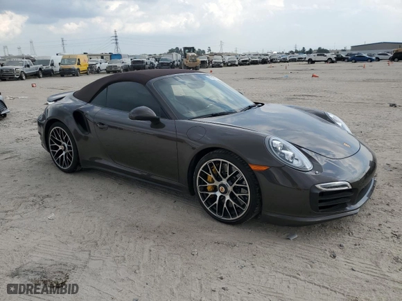 2015 Porsche 911 Turbo S with VIN WP0CD2A98FS178049, listed as a Copart auction lot 73181714 with 11,176 mi miles and Salvage Title. Bid and sale history available at carsss.com. Image 4.