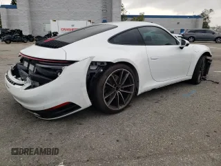 2021 Porsche 911 Carrera with VIN WP0AA2A99MS205692, listed as a Copart auction lot 45731394 with 24,627 mi miles. Bid and sale history available at carsss.com. Image 3.