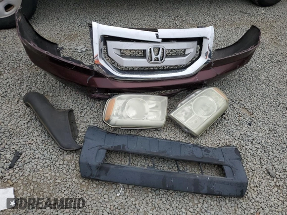 2011 Honda Pilot Touring z VIN 5FNYF3H92BB039165, wystawiony jako Copart lot #59596105 z przebiegiem 182 944 mil mil oraz Szkoda całkowita • Salvage title. Historia ofert i sprzedaży dostępna na DreamBid. Obrazek 13.