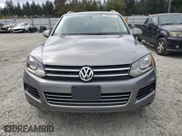 2012 Volkswagen Touareg Sport with VIN WVGFK9BP4CD001860, listed as a Copart auction lot 55090375 with 153,456 mi miles and Salvage title. Bid and sale history available at DreamBid. Image 5.