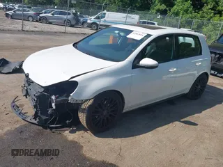 2010 Volkswagen Golf GTI with VIN WVWGV7AJ0AW245797, listed as a IAAI auction lot 42563626 with 127,932 mi miles and . Bid and sale history available at DreamBid. Image 2.
