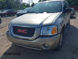 2003 GMC Envoy SLT with VIN 1GKES16S336101568, listed as a IAAI auction lot 40187998 with 185,402 mi miles. Bid and sale history available at carsss.com. Image 6.