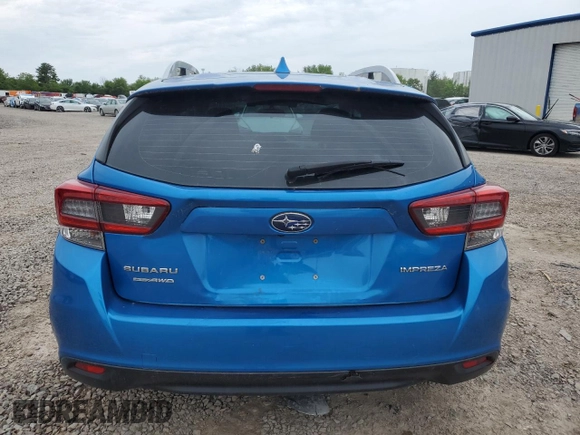 2022 Subaru Impreza Premium with VIN 4S3GTAV60N3711910, listed as a Copart auction lot 60787035 with 58,828 mi miles and Salvage title. Bid and sale history available at DreamBid. Image 6.
