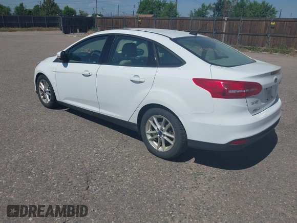 2015 Ford Focus SE z VIN 1FADP3F28FL334359, wystawiony jako IAAI lot #42520827 z przebiegiem 182 755 mil mil oraz . Historia ofert i sprzedaży dostępna na DreamBid. Obrazek 3.