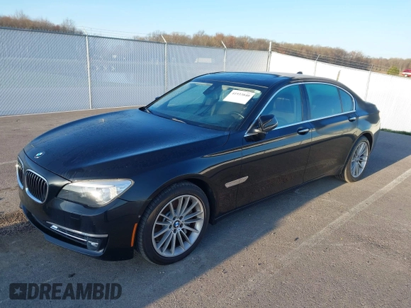 2013 BMW 7 Series 750Li xDrive with VIN WBAYF8C53DD140448, listed as a IAAI auction lot 41933840 with 119,013 mi miles. Bid and sale history available at carsss.com. Image 2.