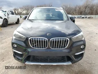 2018 BMW X1 xDrive28i with VIN WBXHT3C32J5L28030, listed as a Copart auction lot 47087415 with 100,708 mi miles and Salvage Title. Bid and sale history available at carsss.com. Image 5.