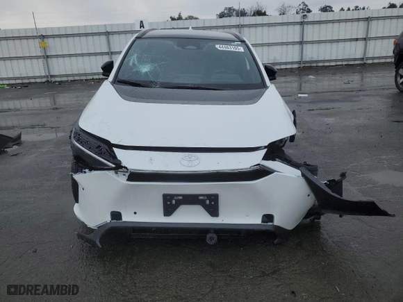 2024 Toyota bZ4X XLE with VIN JTMAAAAA2RA052610, listed as a Copart auction lot 44463105 with 2,020 mi miles and Salvage Title. Bid and sale history available at carsss.com. Image 5.