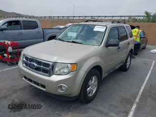 2012 Ford Escape XLT with VIN 1FMCU0D74CKA07739, listed as a IAAI auction lot 42100820 with 308,265 mi miles. Bid and sale history available at carsss.com. Image 2.
