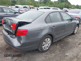 2014 Volkswagen Jetta SE with VIN 3VWD07AJ7EM239807, listed as a IAAI auction lot 42457159 with 72,637 mi miles and . Bid and sale history available at DreamBid. Image 4.
