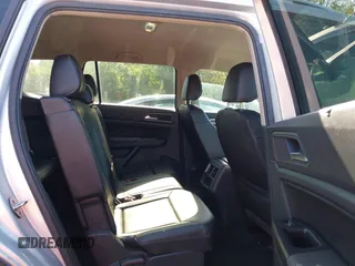 2019 Volkswagen Atlas SE with VIN 1V2UR2CA2KC557449, listed as a IAAI auction lot 42281302 with 106,739 mi miles and . Bid and sale history available at DreamBid. Image 8.