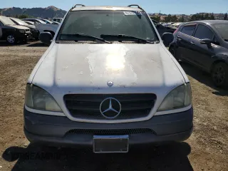 1999 Mercedes-Benz M-Class with VIN 4JGAB54E1XA136722, listed as a Copart auction lot 67978754 with 169,920 mi miles and Clean Title. Bid and sale history available at carsss.com. Image 5.