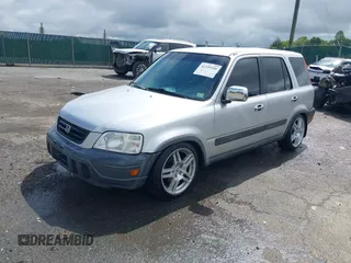 1997 Honda CR-V z VIN JHLRD1848VC057743, wystawiony jako IAAI lot #42259350 z przebiegiem 218 641 mil mil oraz . Historia ofert i sprzedaży dostępna na DreamBid. Obrazek 18.